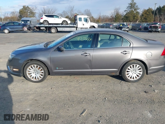 2011 Ford Fusion Hybrid with VIN 3FADP0L35BR316361, listed as a IAAI auction lot 41234840 with 168,768 mi miles and . Bid and sale history available at DreamBid. Image 14.