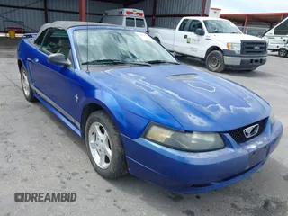 2002 Ford Mustang Deluxe z VIN 1FAFP44452F199787, wystawiony jako IAAI lot #42815107 z przebiegiem 149 505 mil mil oraz . Historia ofert i sprzedaży dostępna na DreamBid. Obrazek 1.