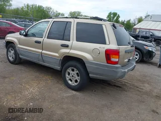 2000 Jeep Grand Cherokee Laredo with VIN 1J4GW48SXYC100248, listed as a IAAI auction lot 42182318 with 227,658 mi miles and . Bid and sale history available at DreamBid. Image 3.