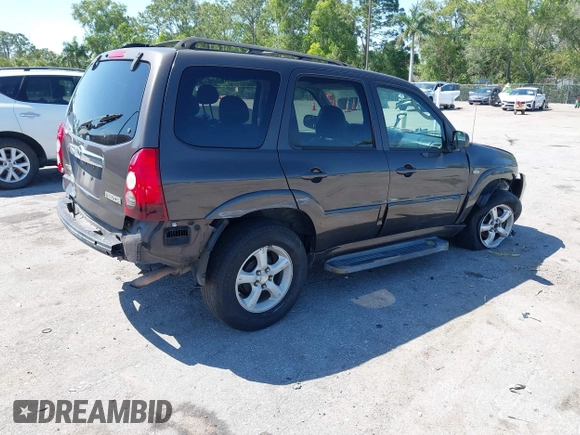 2006 Mazda Tribute i with VIN 4F2YZ02Z36KM29148, listed as a IAAI auction lot 42044163 with 175,786 mi miles and . Bid and sale history available at carsss.com. Image 4.