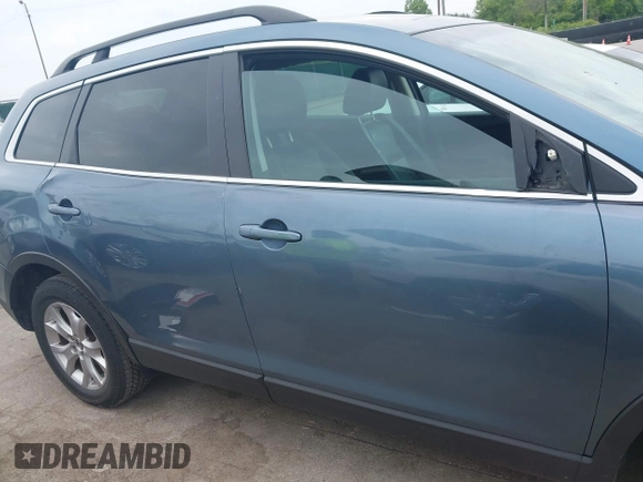 2015 Mazda CX-9 Touring with VIN JM3TB3CV9F0463819, listed as a IAAI auction lot 42506237 with 207,418 mi miles and . Bid and sale history available at DreamBid. Image 13.