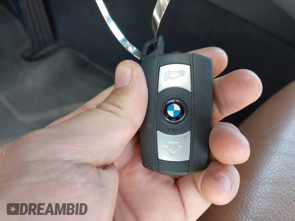 2011 BMW 3 Series 328i with VIN WBAKE3C58BE557891, listed as a IAAI auction lot 41717023 with 99,053 mi miles and . Bid and sale history available at carsss.com. Image 11.