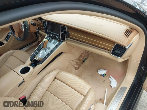 2012 Porsche Panamera with VIN WP0AA2A73CL011361, listed as a IAAI auction lot 41564053 with 126,446 mi miles and . Bid and sale history available at DreamBid. Image 5.