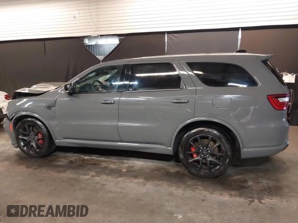 2023 Dodge Durango SRT Hellcat Premium with VIN 1C4SDJH9XPC655507, listed as a IAAI auction lot 42172418 with 1,490 mi miles and . Bid and sale history available at DreamBid. Image 15.