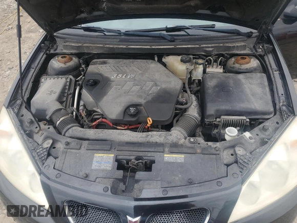 2009 Pontiac G6 GT 1SA z VIN 1G2ZH57NX94102379, wystawiony jako Copart lot #54549215 z przebiegiem 165 284 mil mil oraz Nie do naprawy • Non repairable. Historia ofert i sprzedaży dostępna na DreamBid. Obrazek 11.
