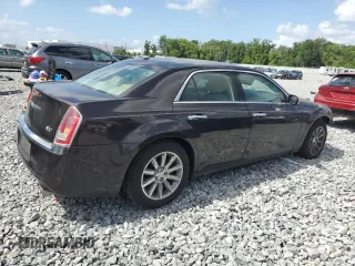 2012 Chrysler 300 Limited z VIN 2C3CCACG9CH173300, wystawiony jako Copart lot #52019775 z przebiegiem 128 492 mil mil oraz Szkoda całkowita • Salvage title. Historia ofert i sprzedaży dostępna na DreamBid. Obrazek 3.