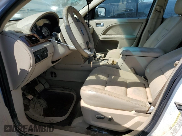 2005 Ford Five Hundred Limited with VIN 1FAFP28135G201703, listed as a Copart auction lot 74421714 with 114,247 mi miles and Salvage Title. Bid and sale history available at carsss.com. Image 7.