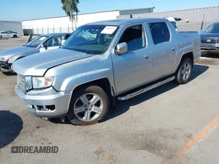 2012 Honda Ridgeline RTL with VIN 5FPYK1F56CB457687, listed as a IAAI auction lot 42582331 with 96,357 mi miles and . Bid and sale history available at DreamBid. Image 17.