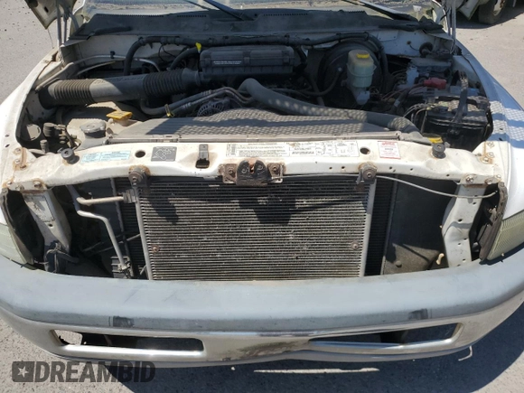 2002 Dodge 2500 z VIN 3B7KC23Z62M212116, wystawiony jako Copart lot #58445855 z przebiegiem 246 902 mil mil oraz Czysty tytuł • Clean title. Historia ofert i sprzedaży dostępna na DreamBid. Obrazek 11.