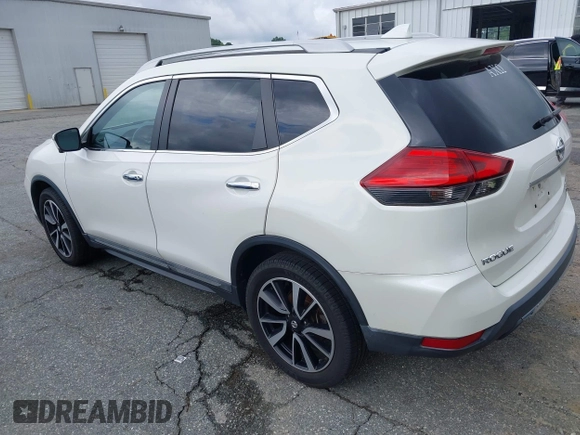 2017 Nissan Rogue SV with VIN 5N1AT2MV5HC812557, listed as a IAAI auction lot 42677622 with 64,686 mi miles and . Bid and sale history available at DreamBid. Image 3.