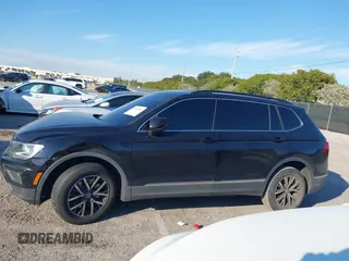 2020 Volkswagen Tiguan SE z VIN 3VV3B7AX1LM019574, wystawiony jako IAAI lot #41450002 z przebiegiem 44 553 mil mil oraz . Historia ofert i sprzedaży dostępna na DreamBid. Obrazek 14.