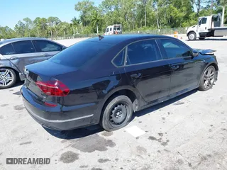 2018 Volkswagen Passat 2.0T S with VIN 1VWAA7A33JC009677, listed as a IAAI auction lot 41796723 with 63,151 mi miles. Bid and sale history available at carsss.com. Image 4.