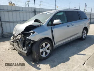 2012 Toyota Sienna LE AAS with VIN 5TDKK3DC2CS207404, listed as a Copart auction lot 62781215 with 200,757 mi miles and Salvage title. Bid and sale history available at DreamBid. Image 1.