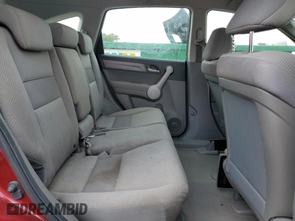 2007 Honda CR-V LX z VIN JHLRE38317C054380, wystawiony jako Copart lot #59285595 z przebiegiem 330 609 mil mil oraz Czysty tytuł • Clean title. Historia ofert i sprzedaży dostępna na DreamBid. Obrazek 11.