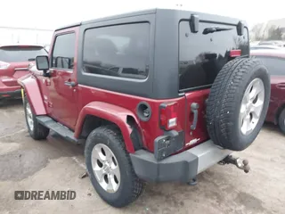 2013 Jeep Wrangler Sahara with VIN 1C4AJWBG7DL501146, listed as a IAAI auction lot 41714555 with 69,324 mi miles and . Bid and sale history available at DreamBid. Image 3.