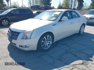 2008 Cadillac CTS RWD z VIN 1G6DV57V280142396, wystawiony jako IAAI lot #42086055 z przebiegiem 183 113 mil mil oraz . Historia ofert i sprzedaży dostępna na DreamBid. Obrazek 2.