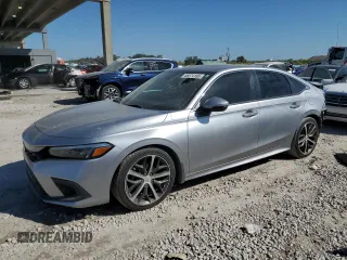 2024 Honda Civic Sedan Touring with VIN 2HGFE1F91RH328206, listed as a Copart auction lot 46074185 with 6,946 mi miles and Salvage Title. Bid and sale history available at carsss.com. Image 1.