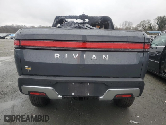 2022 Rivian R1T Adventure z VIN 7FCTGAAA5NN014020, wystawiony jako Copart lot #81367764 z przebiegiem Nie podano mil oraz Szkody całkowita. Historia ofert i sprzedaży dostępna na DreamBid. Obrazek 6.