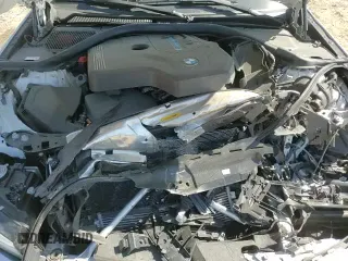 2021 BMW 3 Series 330e с VIN 3MW5P7J03M8B90703, выставлен на аукционе Copart как лот 70053515 с пробегом 39 146 миль миль и Списание • Salvage title. История ставок и продаж доступна на DreamBid. Изображение 13.