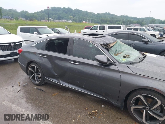 2018 Honda Accord Touring with VIN 1HGCV1F92JA005210, listed as a IAAI auction lot 42378040 with 69,294 mi miles and . Bid and sale history available at DreamBid. Image 18.