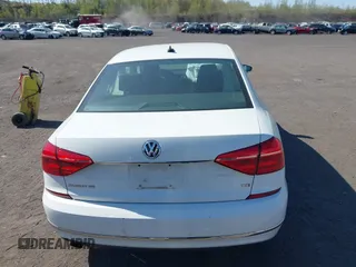 2016 Volkswagen Passat SE z VIN 1VWBT7A38GC016180, wystawiony jako IAAI lot #42132777 z przebiegiem 101 461 mil mil oraz . Historia ofert i sprzedaży dostępna na DreamBid. Obrazek 16.