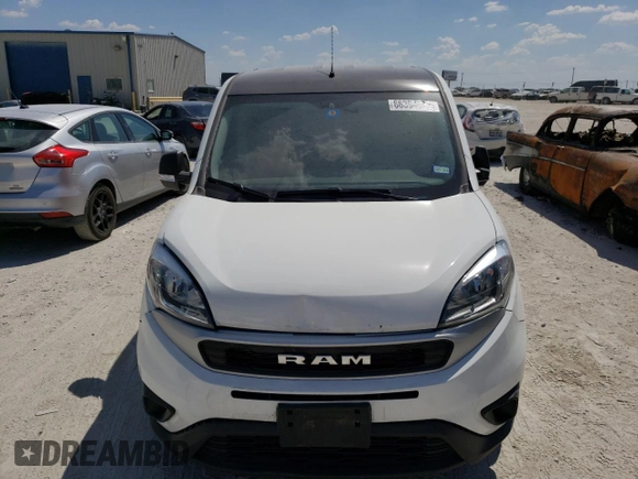 2022 Ram ProMaster City Cargo Tradesman with VIN ZFBHRFAB6N6W69795, listed as a Copart auction lot 66394033 with 10,399 mi miles and . Bid and sale history available at DreamBid. Image 5.