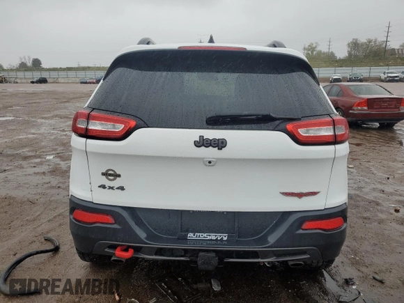 2017 Jeep Cherokee Trailhawk with VIN 1C4PJMBS1HW622388, listed as a Copart auction lot 54990075 with 101,437 mi miles and Salvage title. Bid and sale history available at DreamBid. Image 6.