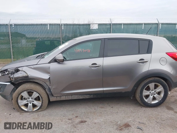 2012 Kia Sportage LX with VIN KNDPB3A28C7332354, listed as a IAAI auction lot 41933058 with 75,938 mi miles. Bid and sale history available at carsss.com. Image 14.