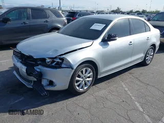 2013 Volkswagen Jetta Sedan SE with VIN 3VWDP7AJ5DM440793, listed as a IAAI auction lot 41936412 with 117,383 mi miles. Bid and sale history available at carsss.com. Image 2.