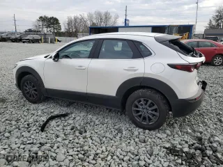 2024 Mazda CX-30 2.5 S with VIN 3MVDMBAM1RM693981, listed as a Copart auction lot 43145635 with 5,452 mi miles and Salvage Title. Bid and sale history available at carsss.com. Image 2.