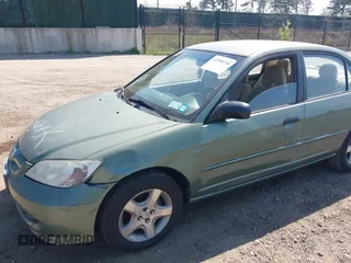 2004 Honda Civic LX with VIN 2HGES16574H501026, listed as a IAAI auction lot 42098740 with 144,915 mi miles. Bid and sale history available at carsss.com. Image 6.