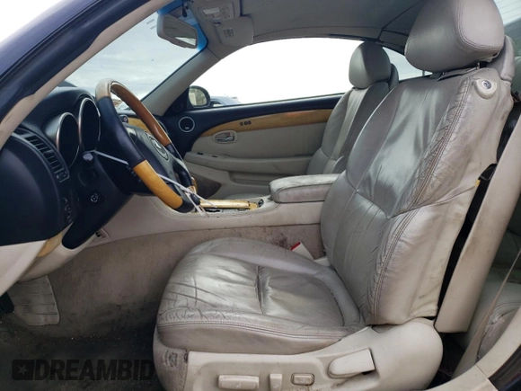 2003 Lexus SC 430 z VIN JTHFN48Y530045385, wystawiony jako Copart lot #72208434 z przebiegiem 211 684 mil mil oraz Szkody całkowita. Historia ofert i sprzedaży dostępna na DreamBid. Obrazek 7.