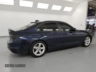 2013 BMW 3 Series 328i with VIN WBA3A5C50DF603562, listed as a Copart auction lot 58589135 with 112,150 mi miles and Salvage title. Bid and sale history available at DreamBid. Image 3.