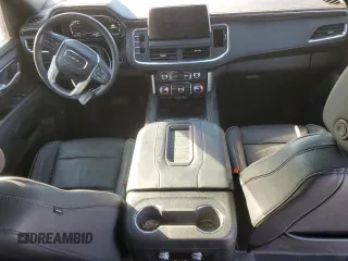 2023 GMC Yukon SLT with VIN 1GKS2BKD5PR209033, listed as a Copart auction lot 87643285 with 61,190 mi miles and Salvage Title. Bid and sale history available at carsss.com. Image 8.