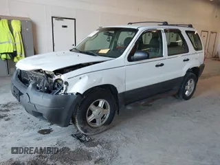 2003 Ford Escape XLS Popular with VIN 1FMYU02123KD48951, listed as a IAAI auction lot 41765772 with 208,796 mi miles. Bid and sale history available at carsss.com. Image 2.