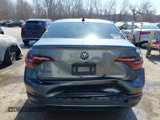 2022 Volkswagen Jetta Sport with VIN 3VWBM7BU6NM017084, listed as a IAAI auction lot 41784555 with 60,364 mi miles and . Bid and sale history available at DreamBid. Image 6.