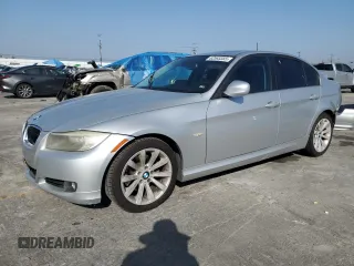 2011 BMW 3 Series 328i with VIN WBAPH5C56BA442027, listed as a Copart auction lot 62583355 with 154,066 mi miles and Salvage title. Bid and sale history available at DreamBid. Image 1.