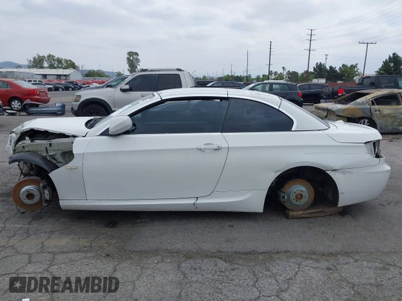 2011 BMW 3 Series 335i with VIN WBADX7C50BE579944, listed as a IAAI auction lot 42111612 with Not Provided miles and . Bid and sale history available at carsss.com. Image 14.