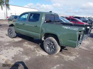 2021 Toyota Tacoma 4WD SR with VIN 3TMCZ5AN9MM408803, listed as a IAAI auction lot 41746099 with 62,823 mi miles. Bid and sale history available at carsss.com. Image 3.
