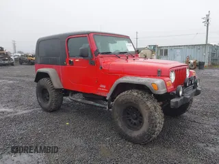 2005 Jeep Wrangler Unlimited with VIN 1J4FA44S15P365113, listed as a IAAI auction lot 41324465 with 126,983 mi miles and . Bid and sale history available at DreamBid. Image 1.