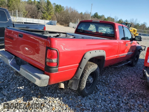 2001 Dodge 2500 z VIN 1B7KC236X1J603433, wystawiony jako Copart lot #86824874 z przebiegiem 204 906 mil mil oraz Szkoda całkowita • Salvage title. Historia ofert i sprzedaży dostępna na DreamBid. Obrazek 3.