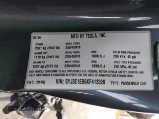 2019 Tesla Model 3 Long Range with VIN 5YJ3E1EB6KF413320, listed as a IAAI auction lot 41760428 with 90,441 mi miles and . Bid and sale history available at DreamBid. Image 9.