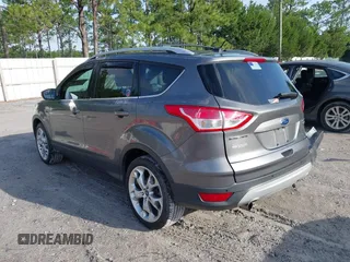 2013 Ford Escape Titanium with VIN 1FMCU0J96DUC31879, listed as a IAAI auction lot 42637019 with 66,096 mi miles and . Bid and sale history available at DreamBid. Image 3.