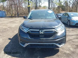2020 Honda CR-V Touring with VIN 2HKRW2H98LH660573, listed as a IAAI auction lot 41524610 with 37,493 mi miles and . Bid and sale history available at DreamBid. Image 12.
