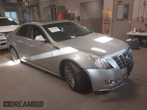2012 Cadillac CTS Premium z VIN 1G6DS5E33C0139591, wystawiony jako IAAI lot #41985026 z przebiegiem 151 810 mil mil oraz . Historia ofert i sprzedaży dostępna na DreamBid. Obrazek 1.