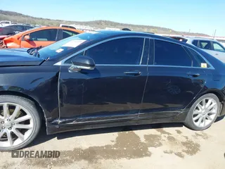 2015 Lincoln MKZ with VIN 3LN6L2G93FR619701, listed as a IAAI auction lot 41794410 with 77,201 mi miles. Bid and sale history available at carsss.com. Image 15.