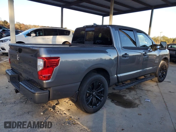 2023 Nissan Titan SV with VIN 1N6AA1ED8PN106127, listed as a Copart auction lot 82214774 with 39,089 mi miles and Salvage title. Bid and sale history available at DreamBid. Image 3.