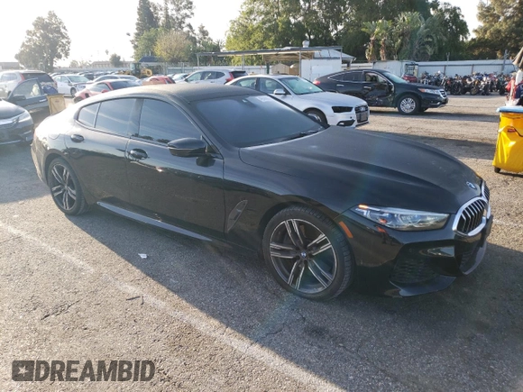 2020 BMW 8 Series 840i with VIN WBAGV4C06LCE28998, listed as a Copart auction lot 48566634 with 54,946 mi miles and Salvage title. Bid and sale history available at DreamBid. Image 4.