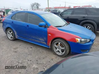 2010 Mitsubishi Lancer GTS with VIN JA32X8HW1AU005888, listed as a IAAI auction lot 41497454 with 217,023 mi miles. Bid and sale history available at carsss.com. Image 1.