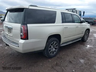 2015 GMC Yukon XL Denali with VIN 1GKS2JKJ2FR590502, listed as a IAAI auction lot 41758575 with 129,777 mi miles. Bid and sale history available at carsss.com. Image 4.